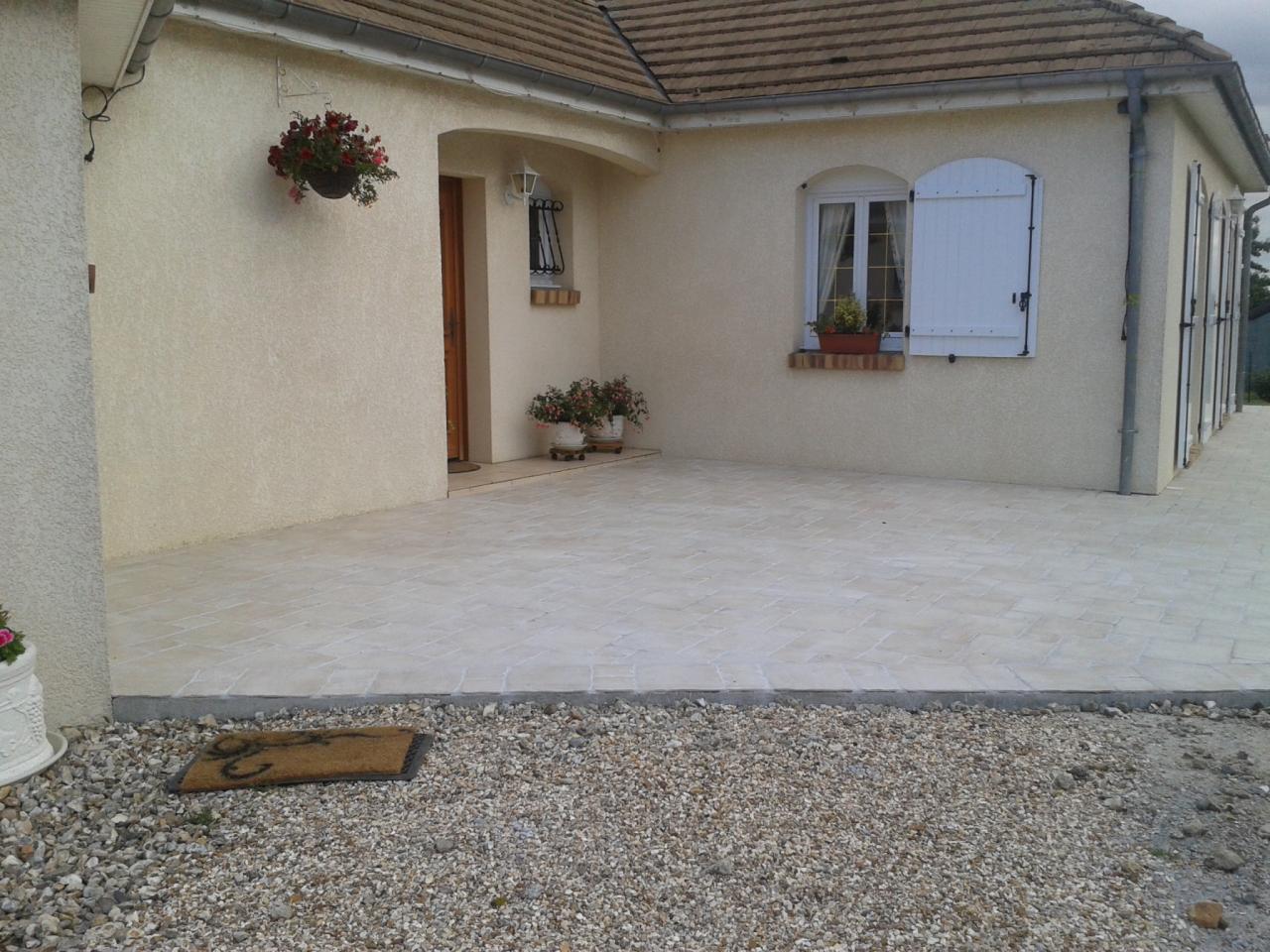 Pose de carrelage multi-formats sur une terrasse