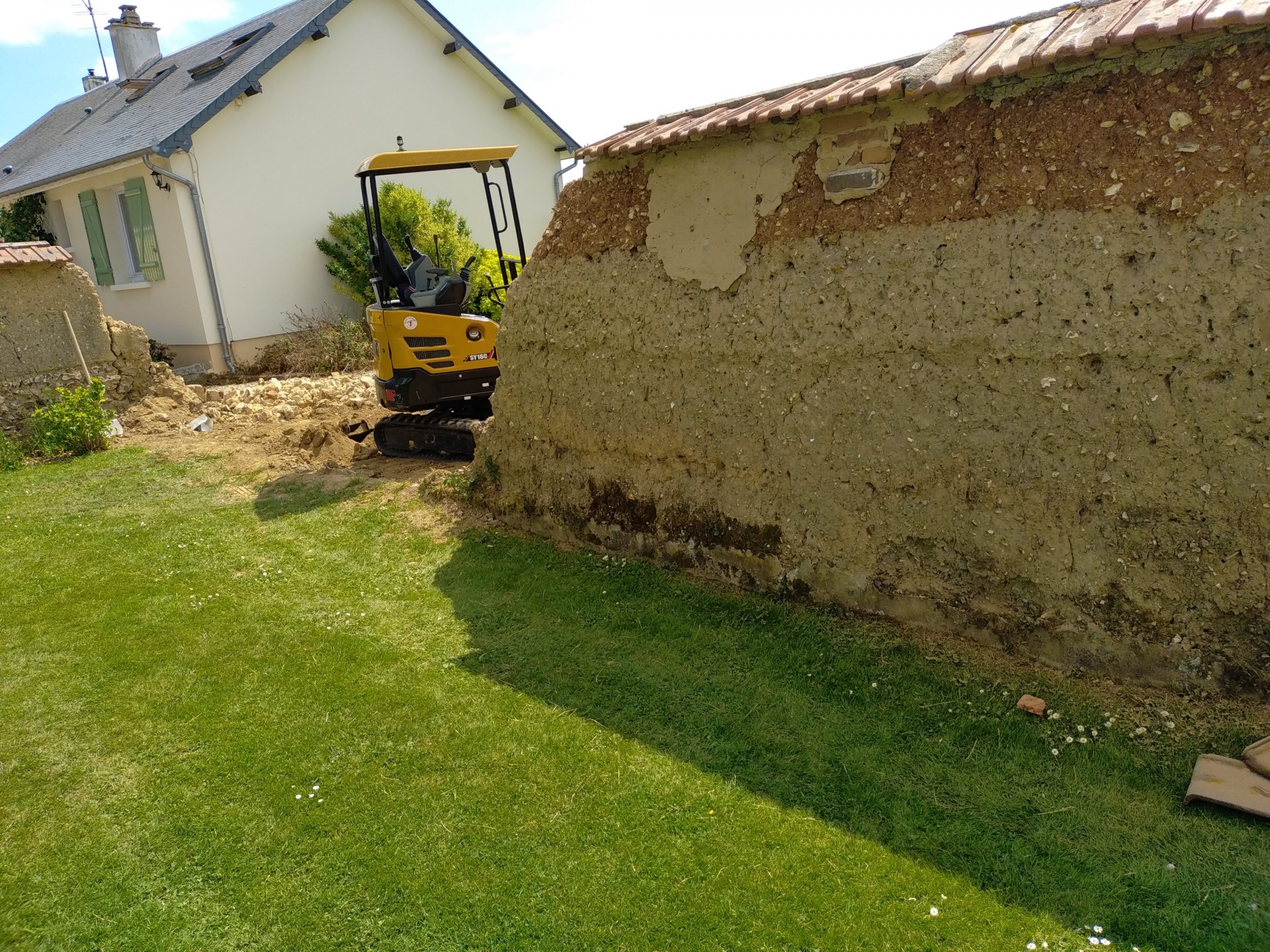 Création d'une clôture en panneau rigide suite chute de mur en bauge